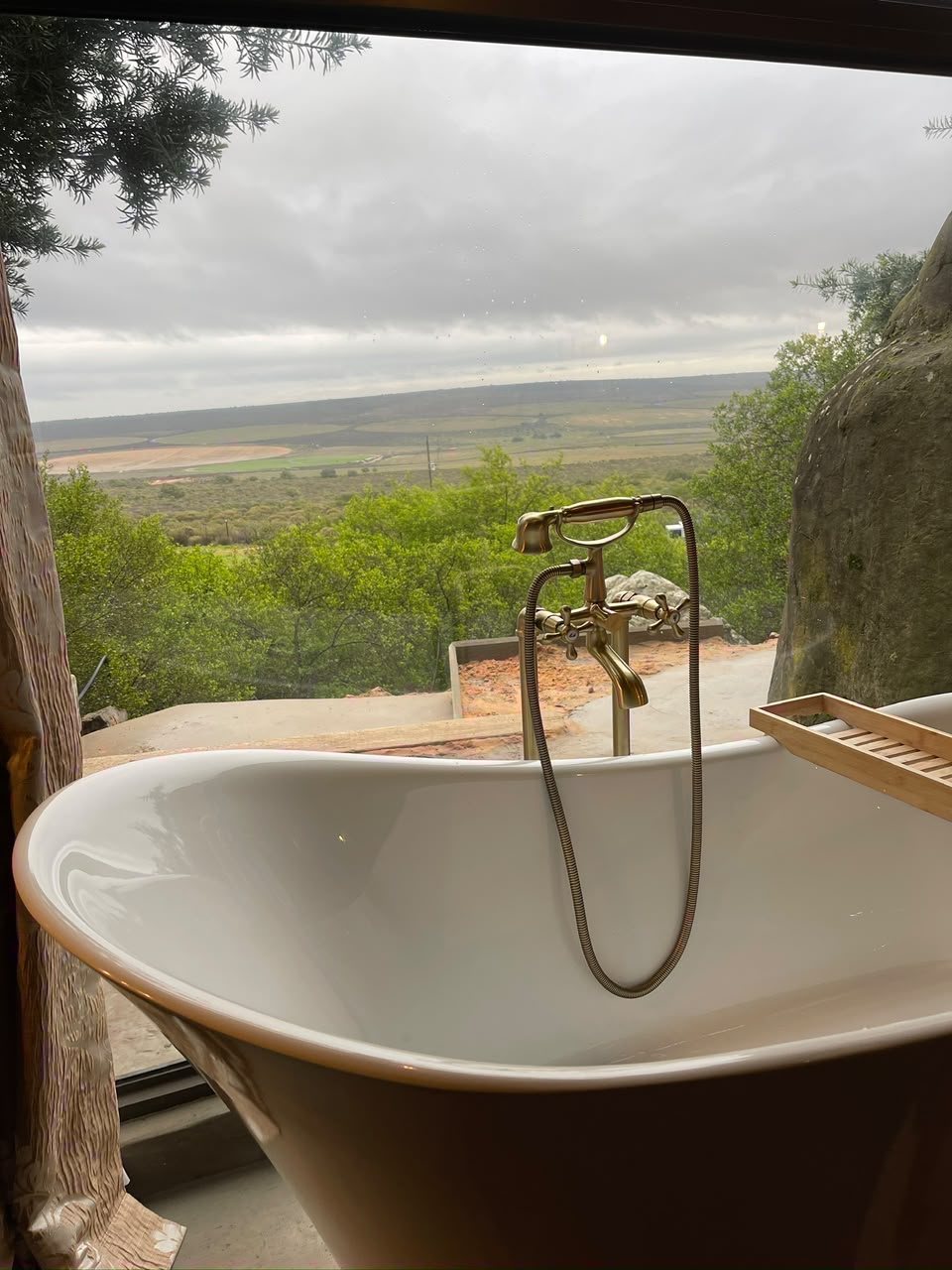 Victorian-style bath inside a Donkieskraal cave chalet